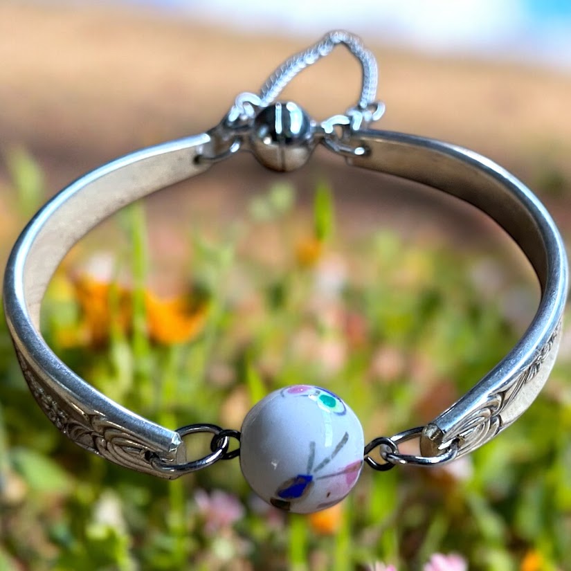 Upcycled pretty repurposed silver-plated bracelet with beautiful ceramic bead made from vintage cutlery