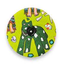 Load image into Gallery viewer, Upcycled double sided round padded playing card holder for kids or adults NATIVE DOG
