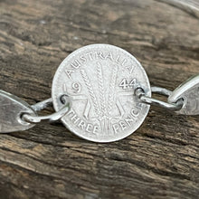 Load image into Gallery viewer, Upcycled pretty repurposed silver-plated apostle &amp; 1944 threepence coin bracelet made from vintage cutlery
