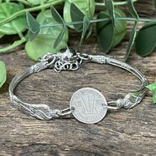 Load image into Gallery viewer, Upcycled pretty repurposed silver-plated apostle &amp; 1950 threepence coin bracelet made from vintage cutlery
