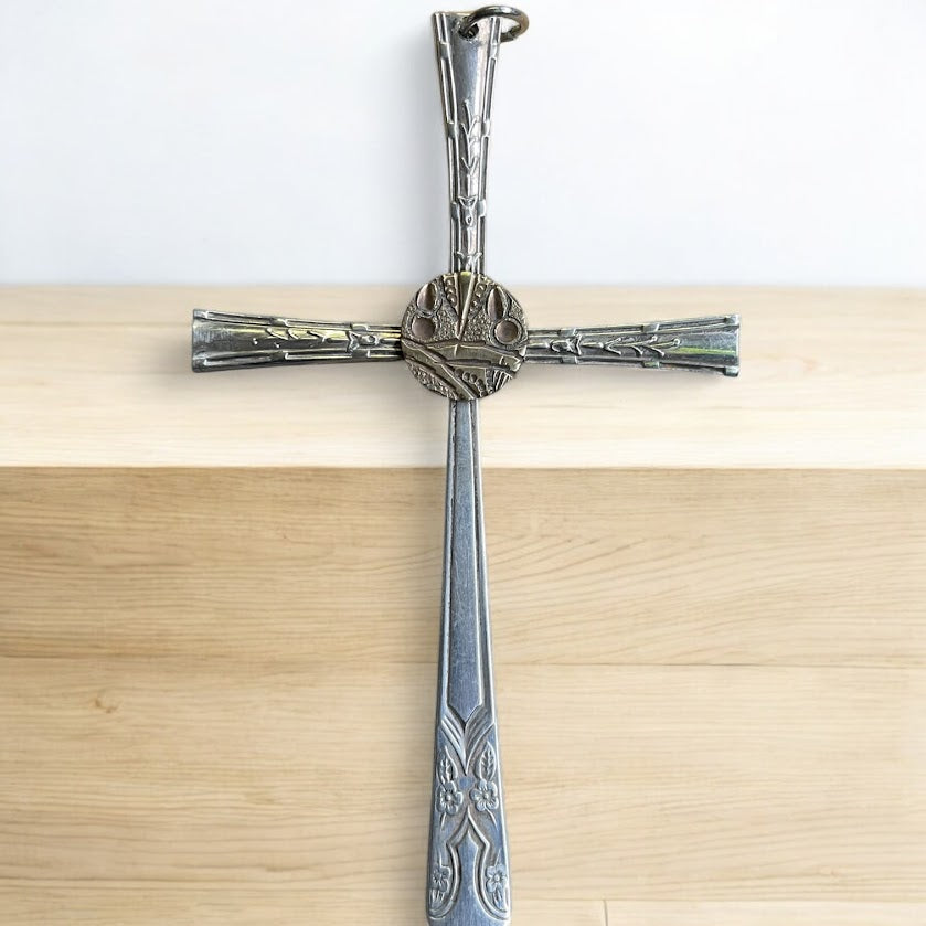 Beautiful crucifix cross hanging ornament made from upcycled silver plated cutlery