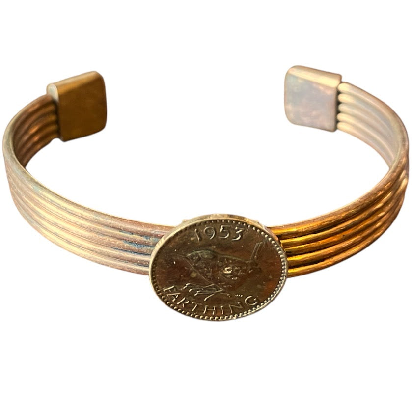 Upcycled and repurposed copper wire bracelet with 1953 farthing