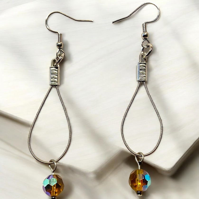 Upcycled repurposed guitar string with beautiful vintage orange bead earrings
