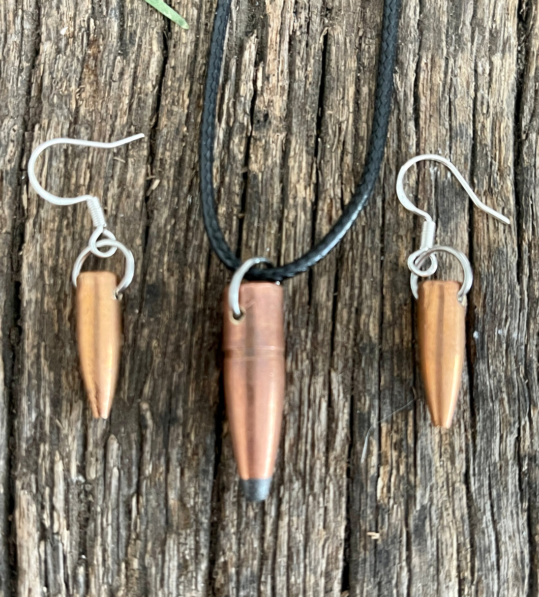 Stunning upcycled repurposed bullet steampunk pendant and hook drop earrings