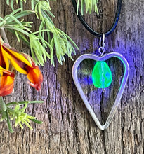 Load image into Gallery viewer, Beautiful heart shaped upcycled repurposed steampunk pendant with uranium glass bead made from silver plated cutlery
